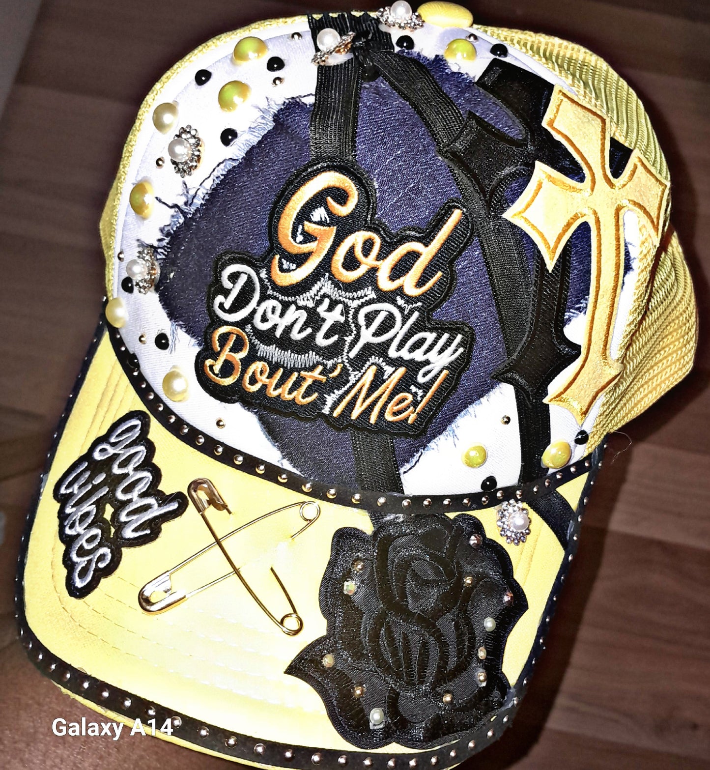 Yellow- "God don't play about me" junk hat