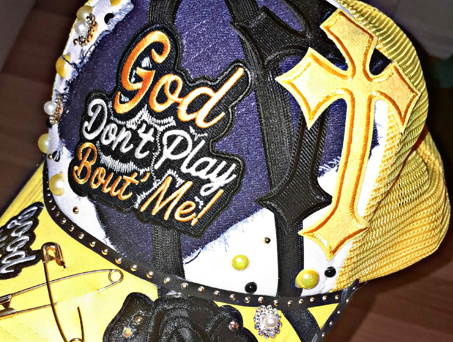 Yellow- "God don't play about me" junk hat