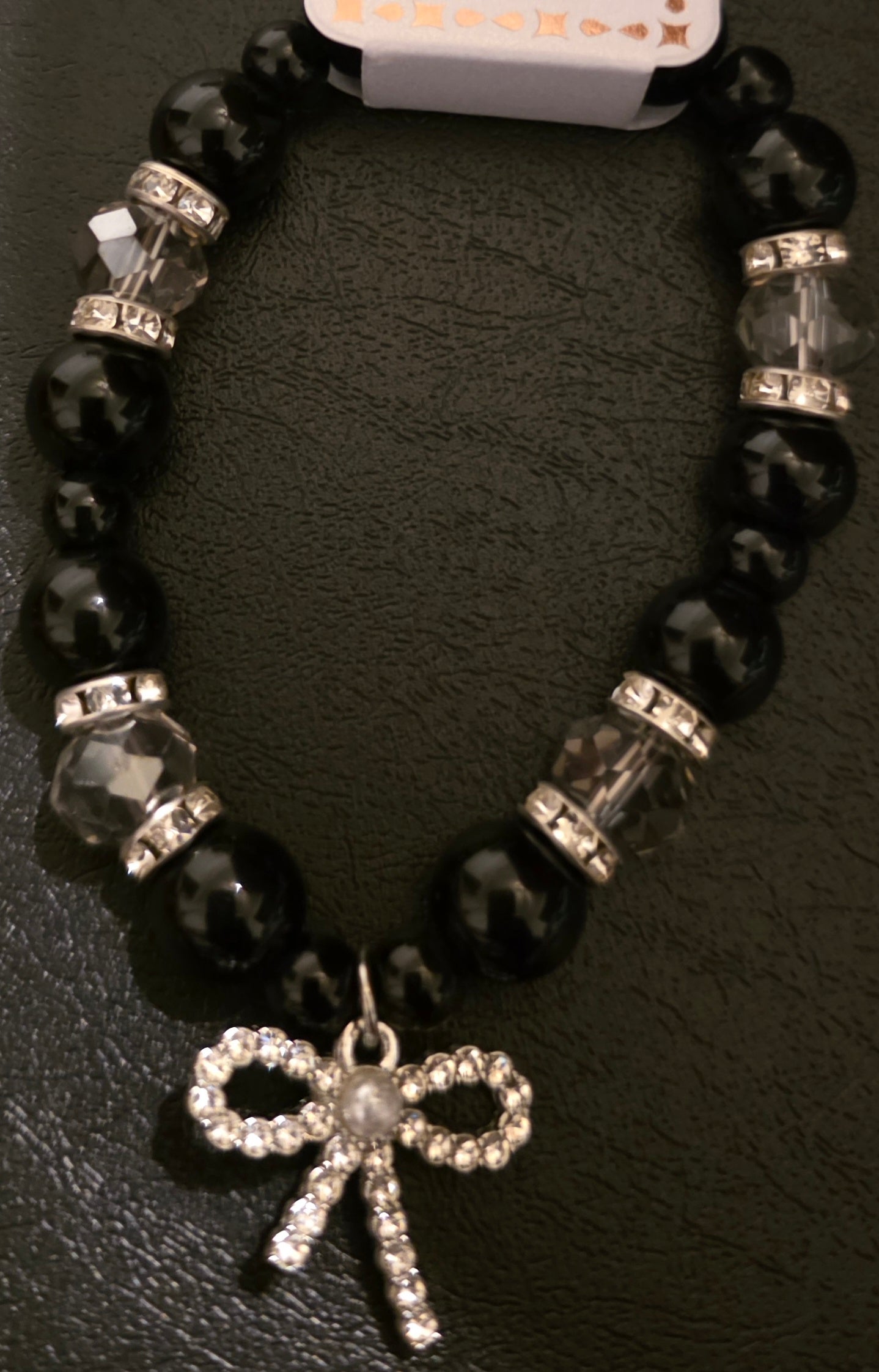 Black beaded bow bracelet